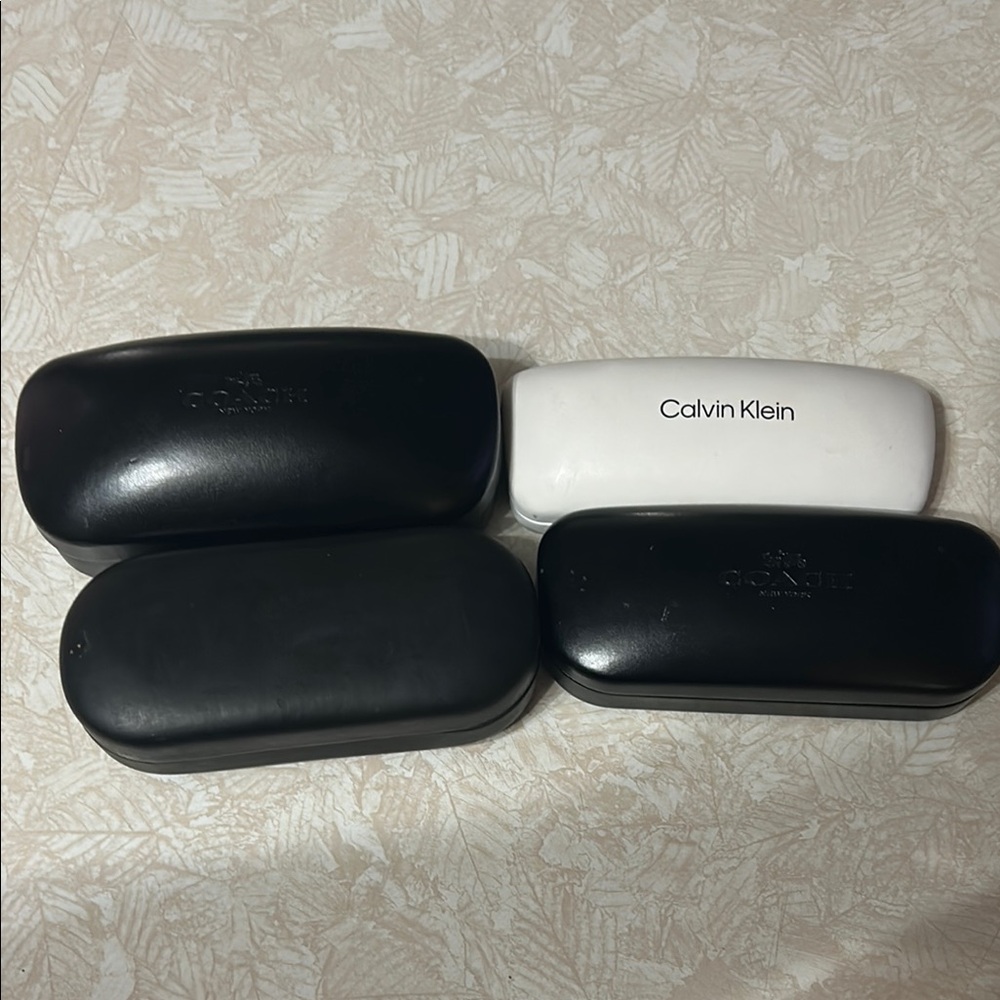 Bundle of Hard Shell Sunglasses Cases - Coach, Calvin Klein & Sun Glasses Hut